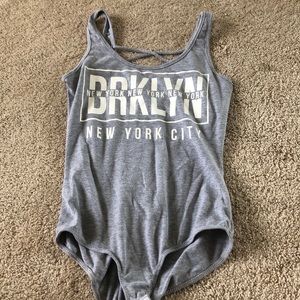 Charlotte Russe gray cross back New York bodysuit
